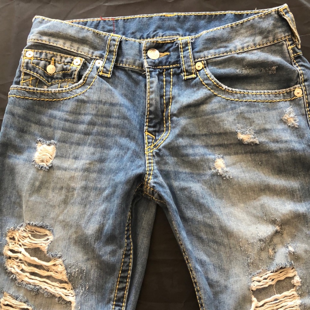 True Religion, used, ripped straight leg jeans.